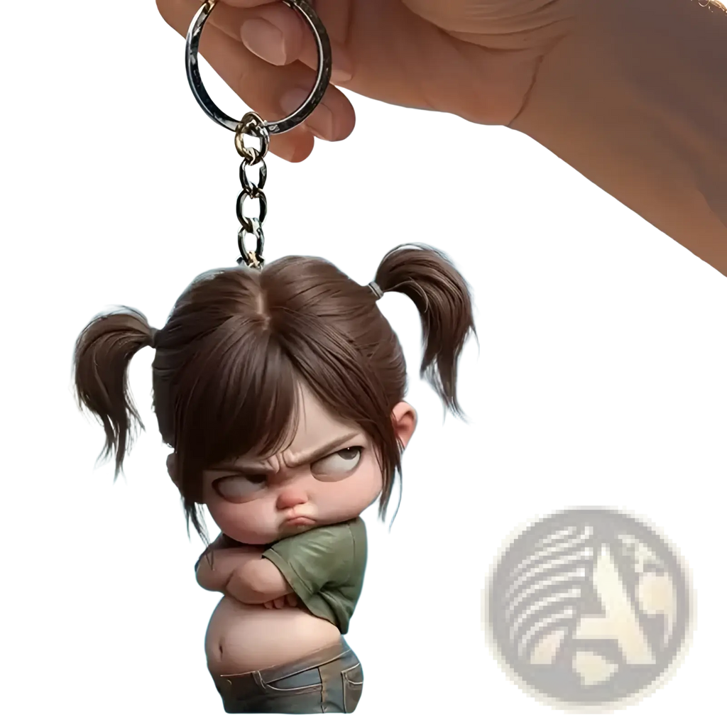 A 2d acrylic flat keychain featuring a cartoon girl with brown pigtails and an angry expression wearing green and jeans