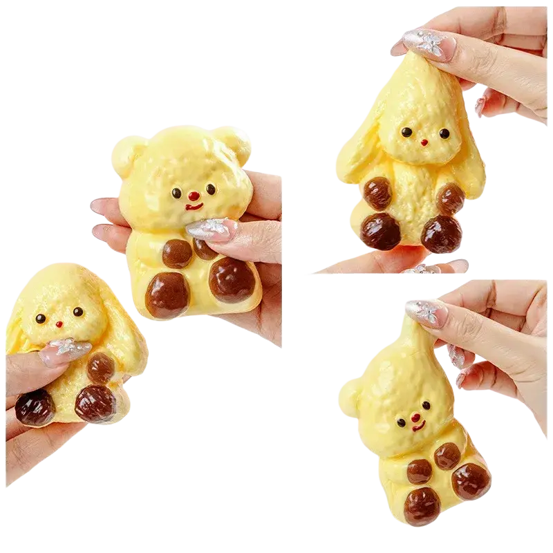 Yellow bear-shaped squishy toy with brown paw accents and red nose for sensory fidget stress relief