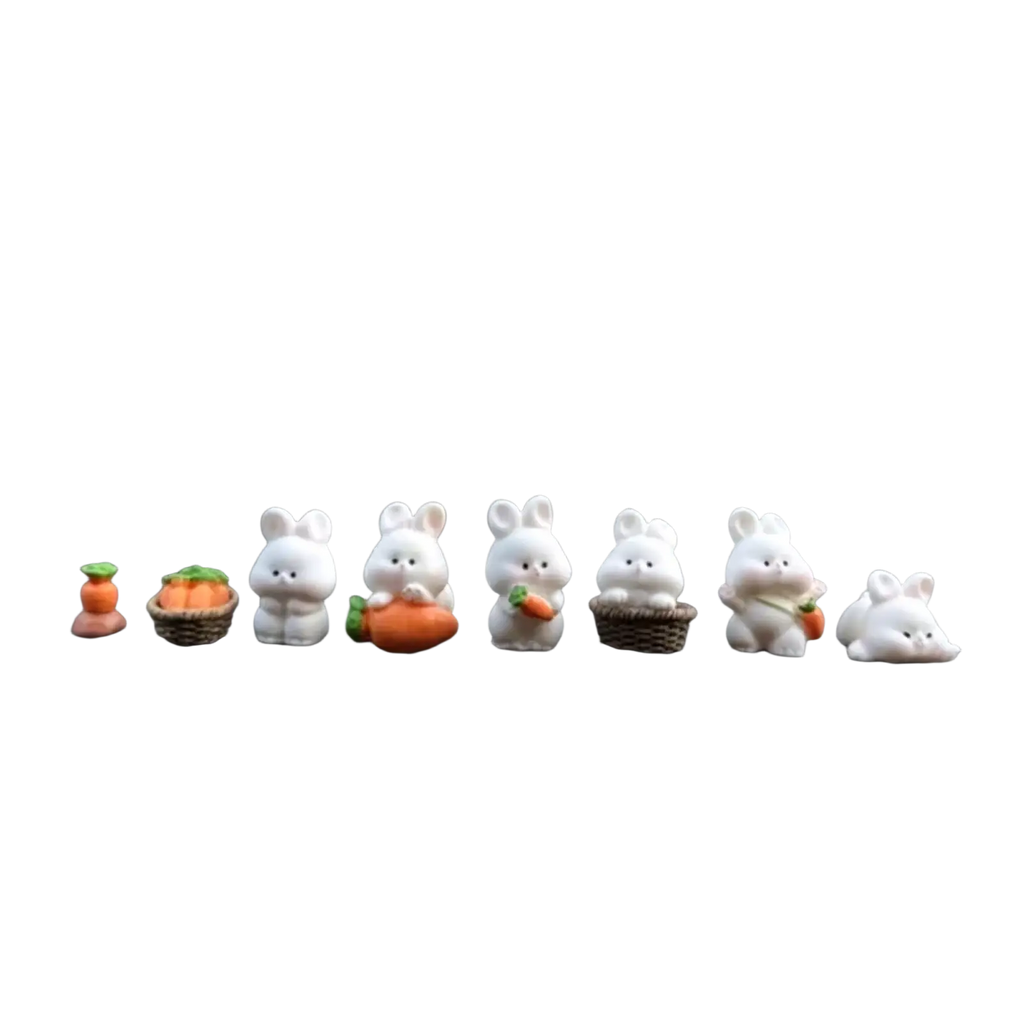 A row of white cute bunny car dashboard ornaments featuring various carrot-themed accessories in ceramic material
