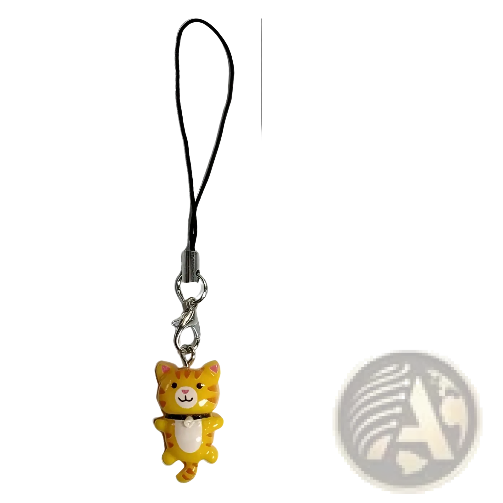 A cheerful orange cat charm phone strap with white belly pink ears attached to black cord with silver clasp