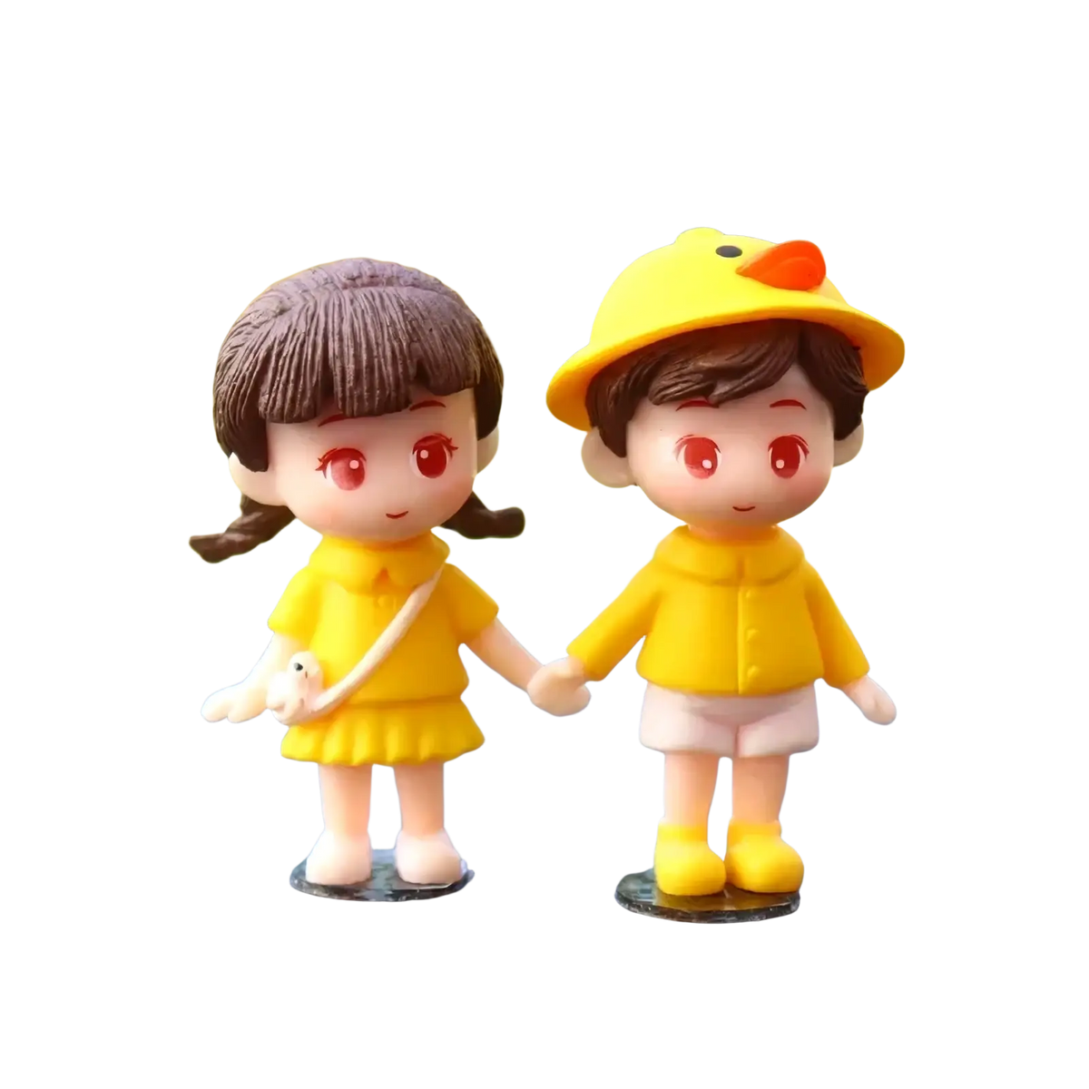 Yellow plastic resin figurines of a cute couple holding hands with boy wearing a duck hat dashboard ornament