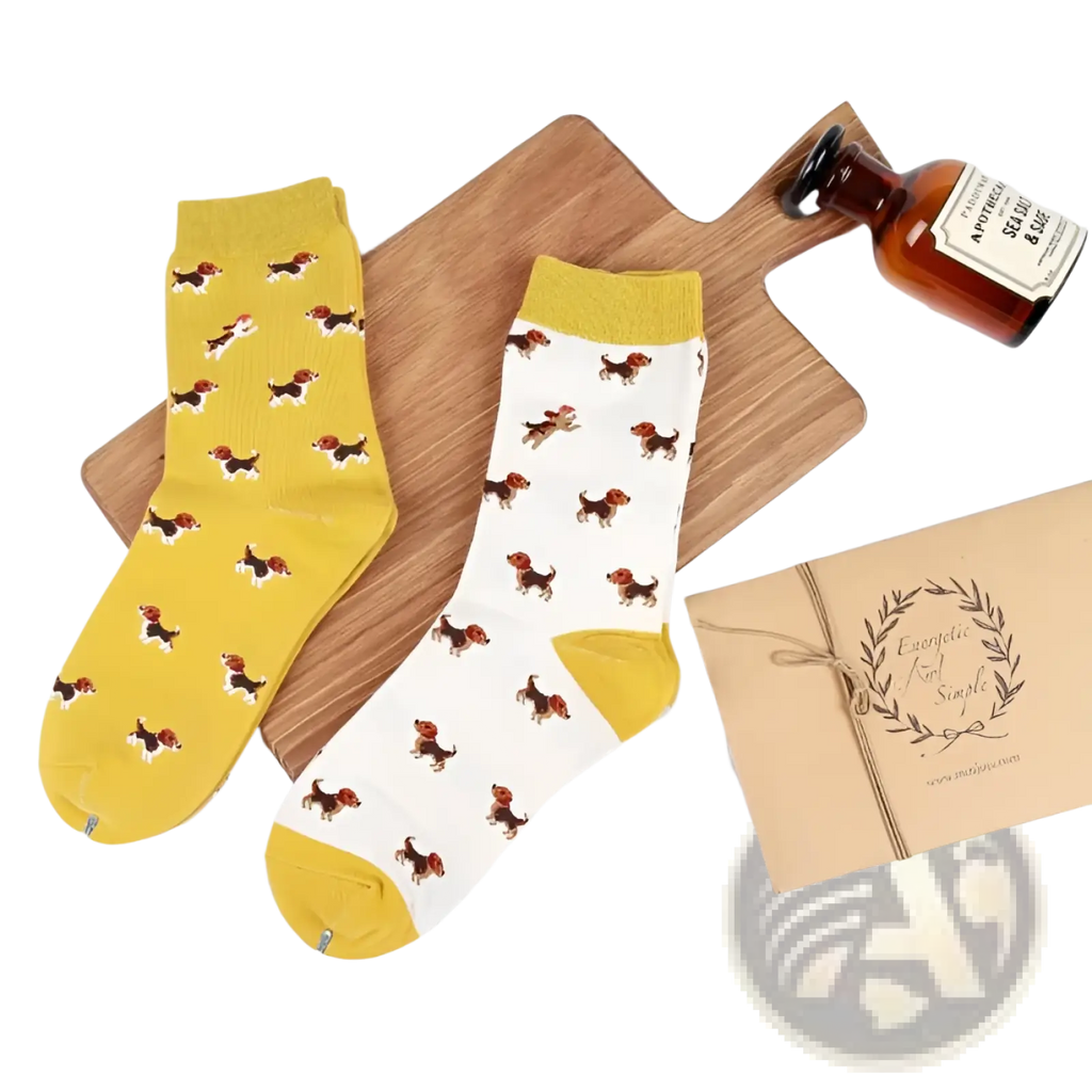 A pair of cheerful cotton crew socks featuring a playful beagle dog pattern in vibrant yellow and white
