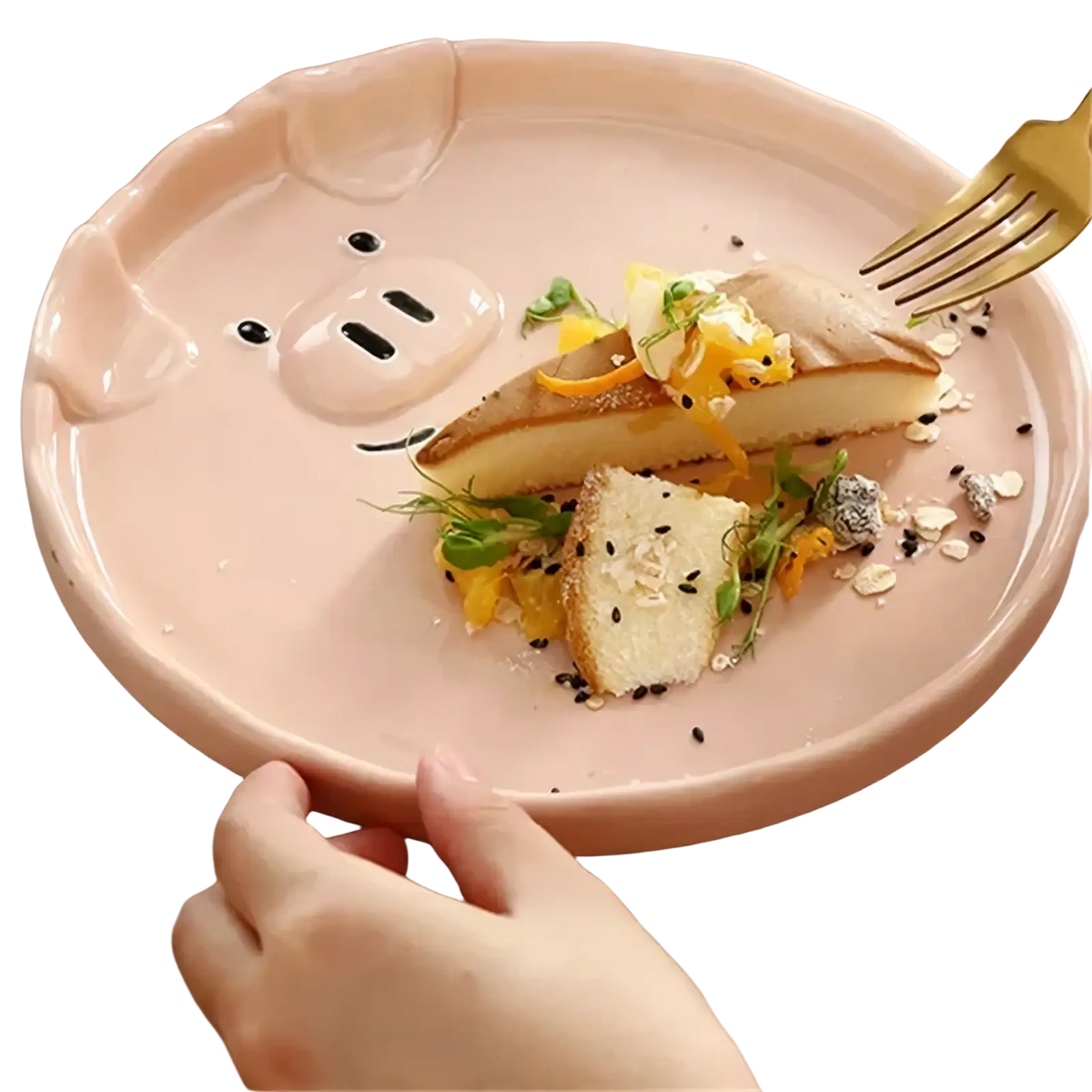 Pastel pink ceramic pig-shaped plate with black eyes and snout from the cute pig ceramic dinnerware set
