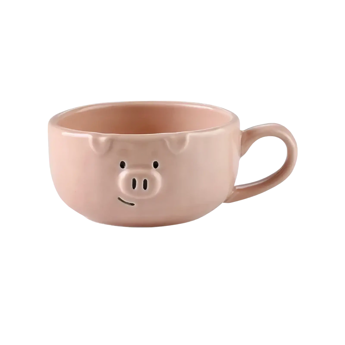 A pink ceramic mug shaped like a pig with black dot eyes snout and smiling mouth from the cute pig ceramic dinnerware set