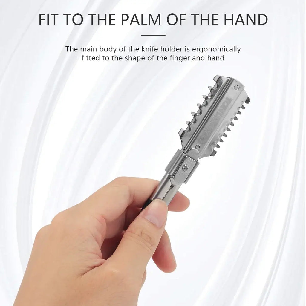 Silver metallic stainless steel hair cutting razor with serrated blade edge and ergonomic grip for precise hair cutting
