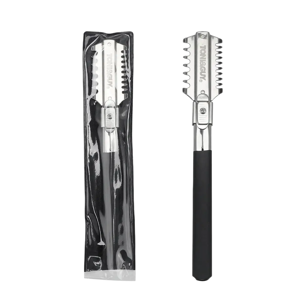 Silver-toned toni&guy stainless steel hair cutting razor with black grip and serrated teeth for precise hair cutting