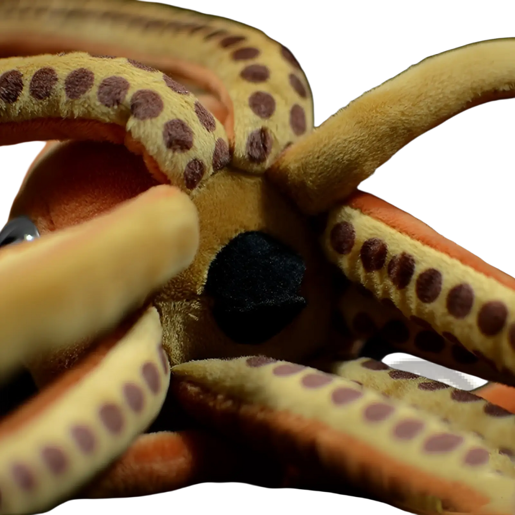A cuttlefish plush stuffed animal toy 32cm made of tan and orange fabric with brown polka dots on tentacles