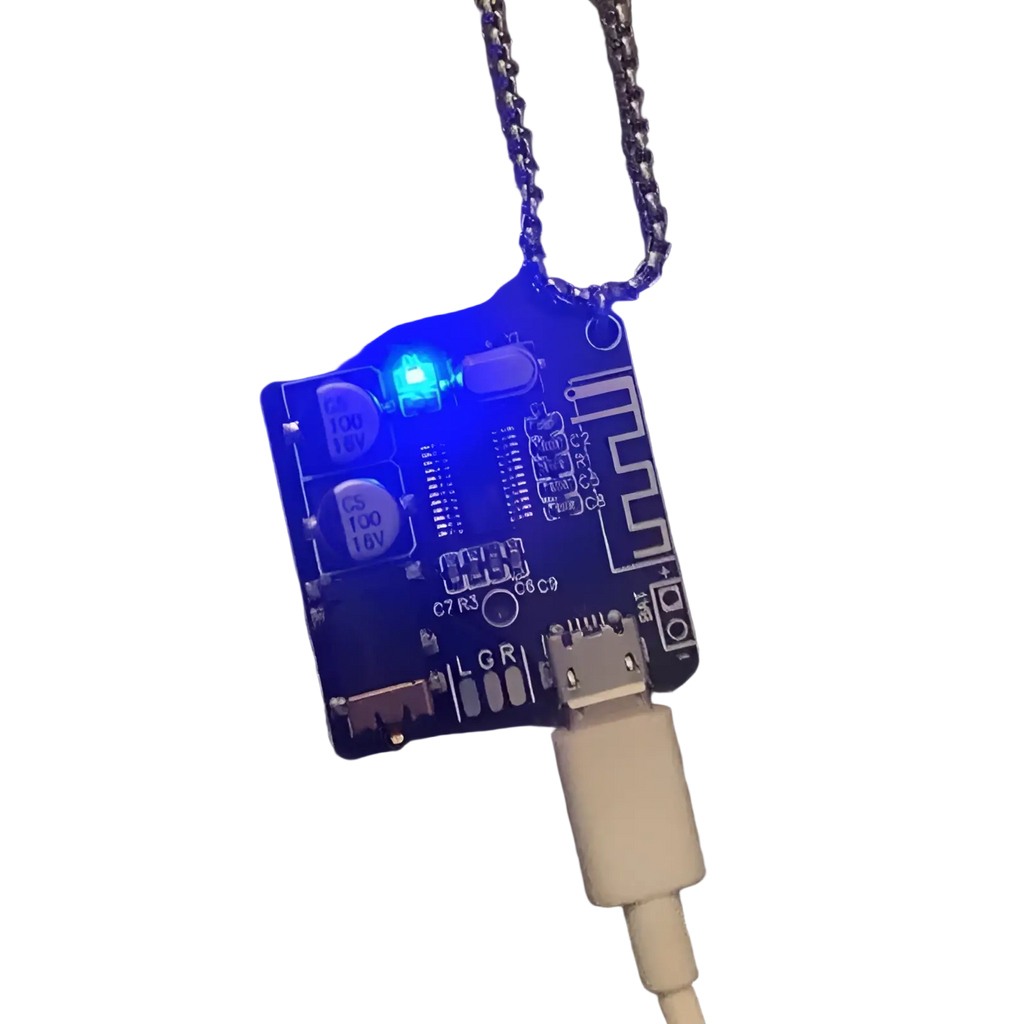 Blue led circuit board keychain pendant with silver chain and usb cable attached showcasing cyberpunk design