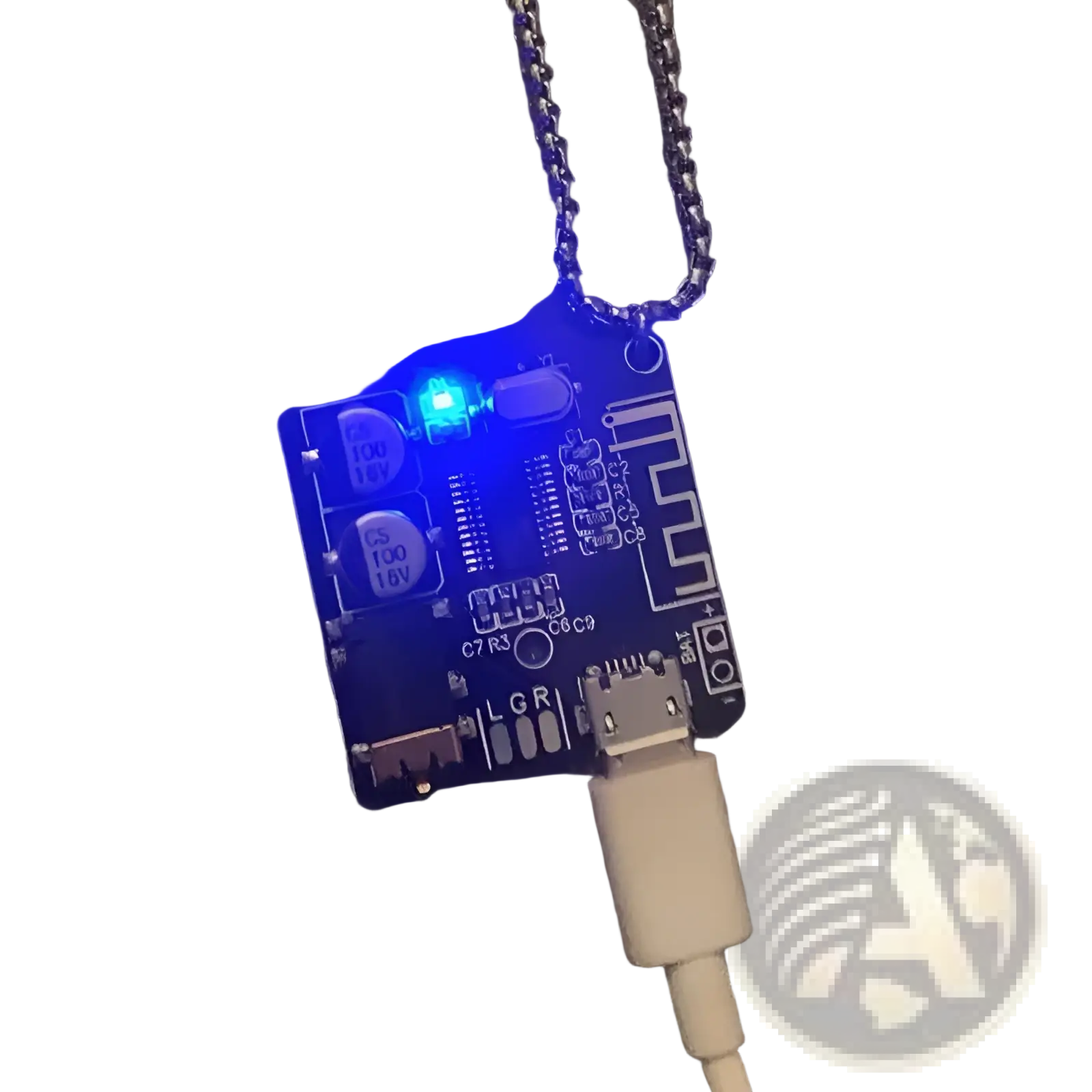 Blue led circuit board keychain pendant with silver chain and usb cable attached showcasing cyberpunk design