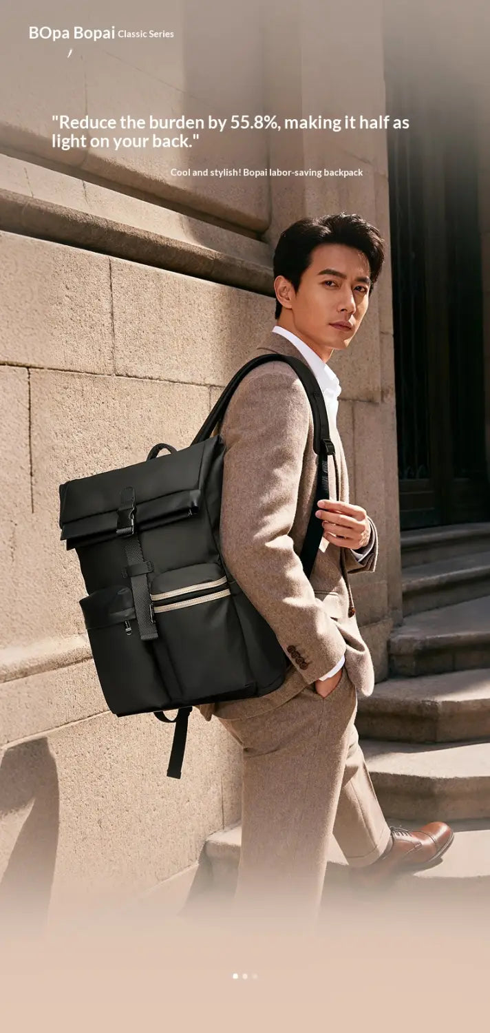 Black bopa bopa classic series roll top business backpack in black with sleek minimalist design, subtle white trim accents, and water-resistant 25l capacity.