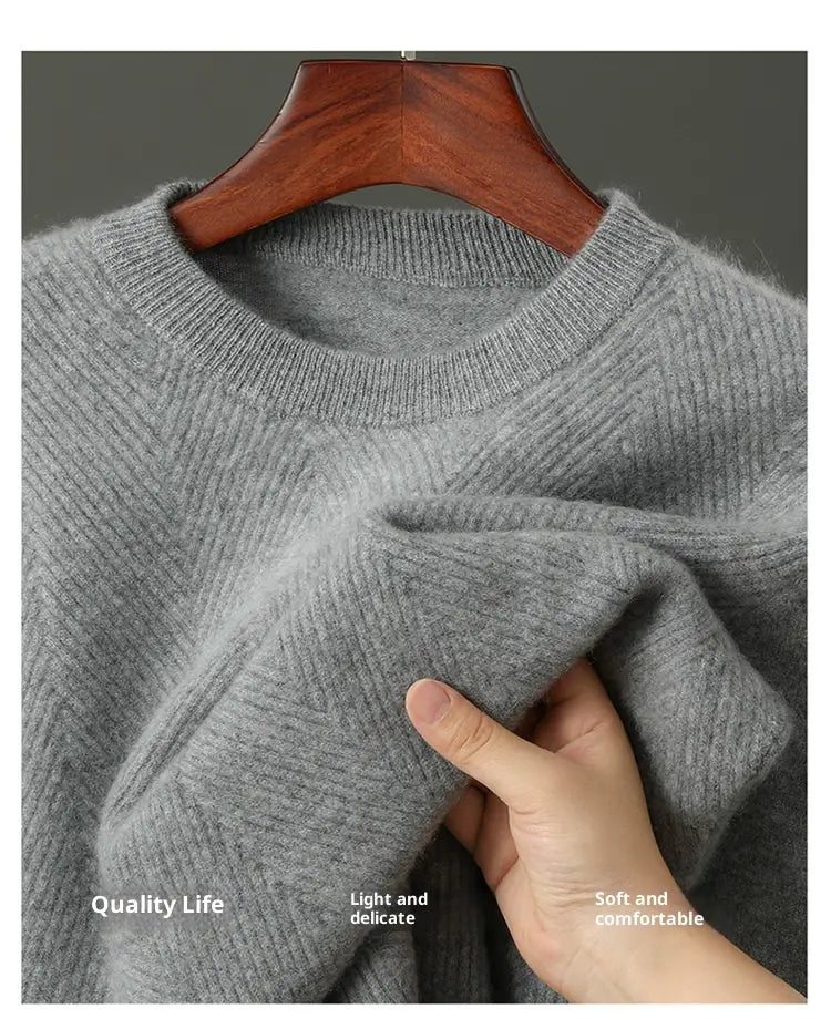Men’s herringbone knit cashmere pullover sweater in soft heather gray with ribbed texture and fine knit weave.