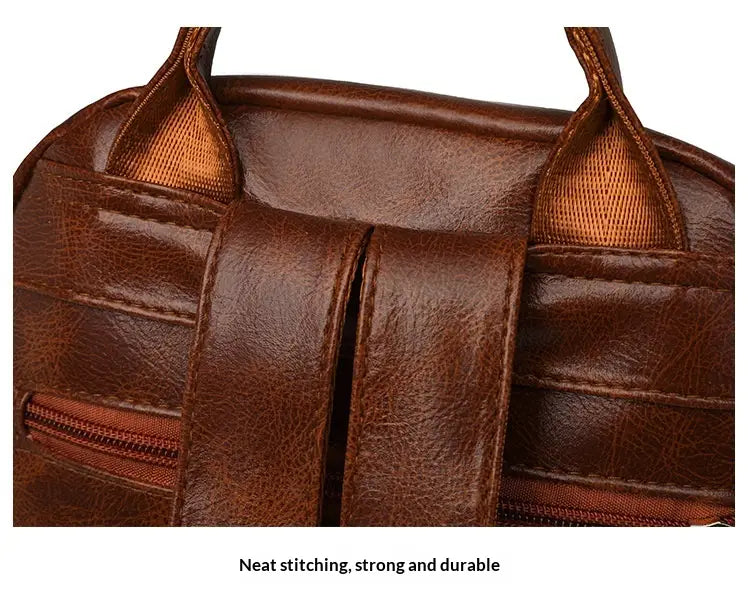 brown faux leather women’s commuter backpack with large capacity featuring sturdy stitching and orange fabric lining