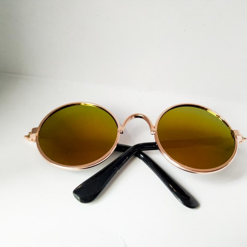 rose gold metal round cat sunglasses featuring gradient green and brown mirrored lenses
