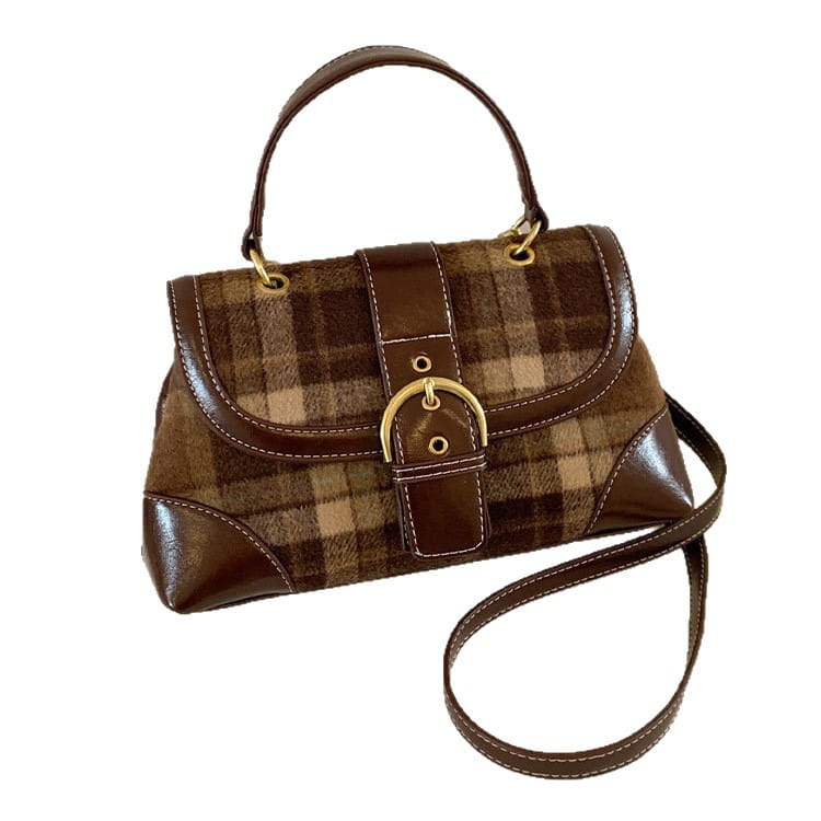 Bolso bandolera vintage de cuadros en marrón con ribete de cuero y hebilla en tono dorado.