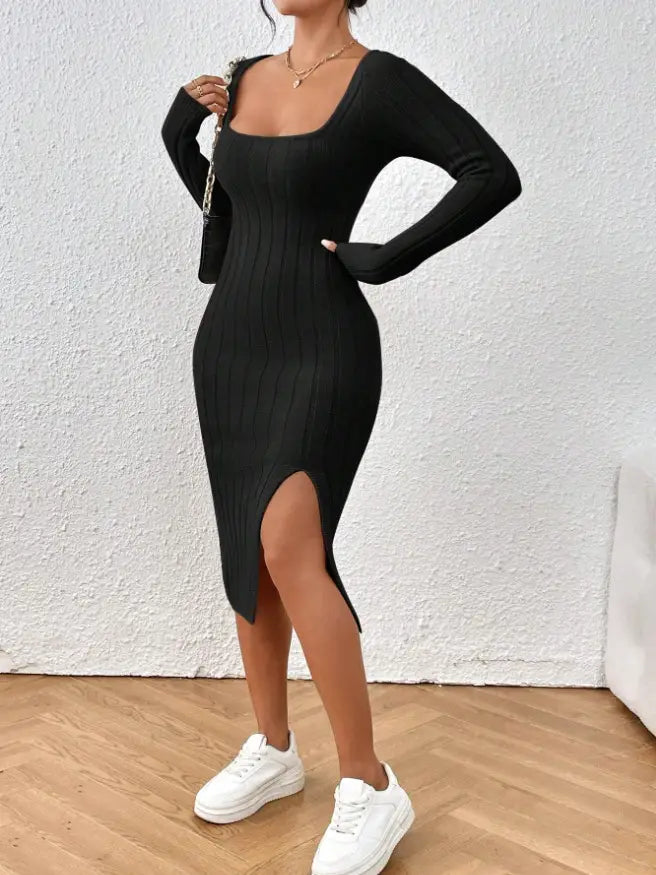 Black ribbed knit midi dress with a square neckline and side slit showcasing elegant knit texture and modern design.