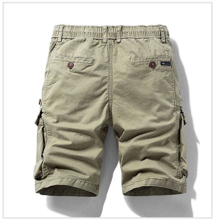 Men’s cotton cargo shorts in khaki with a relaxed fit, multiple pockets, and brown button closures, featuring a drawstring for adjustable comfort.
