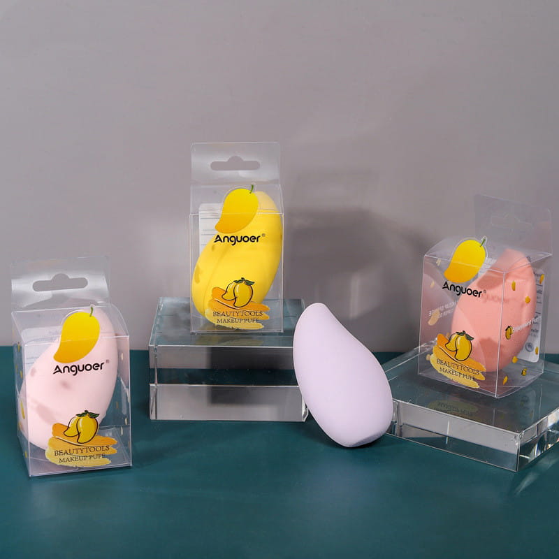 A soft light purple hydrophilic mango shaped makeup sponge from the brand anguoer in a makeup sponge set hydrophilic beauty blender kit.