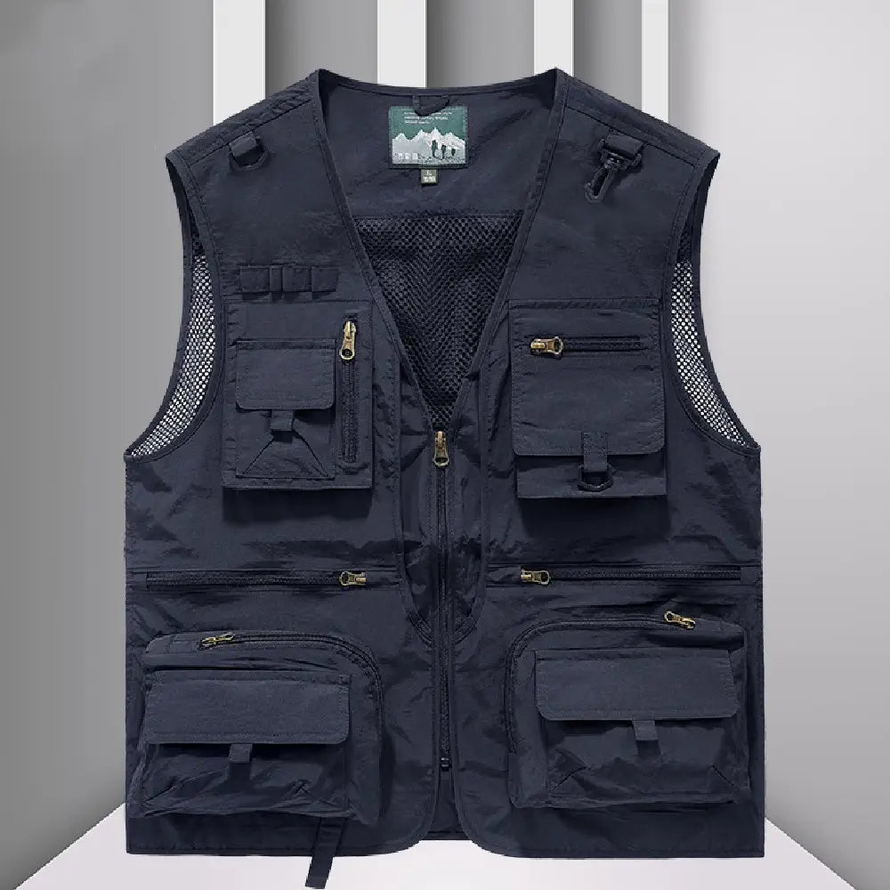Gilet utilitaire en mesh à séchage rapide pour hommes noir, avec plusieurs poches zippées et des panneaux en mesh sur les côtés.