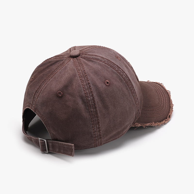 Brown distressed cotton baseball cap with frayed brim and adjustable strap featuring embroidered logo.
