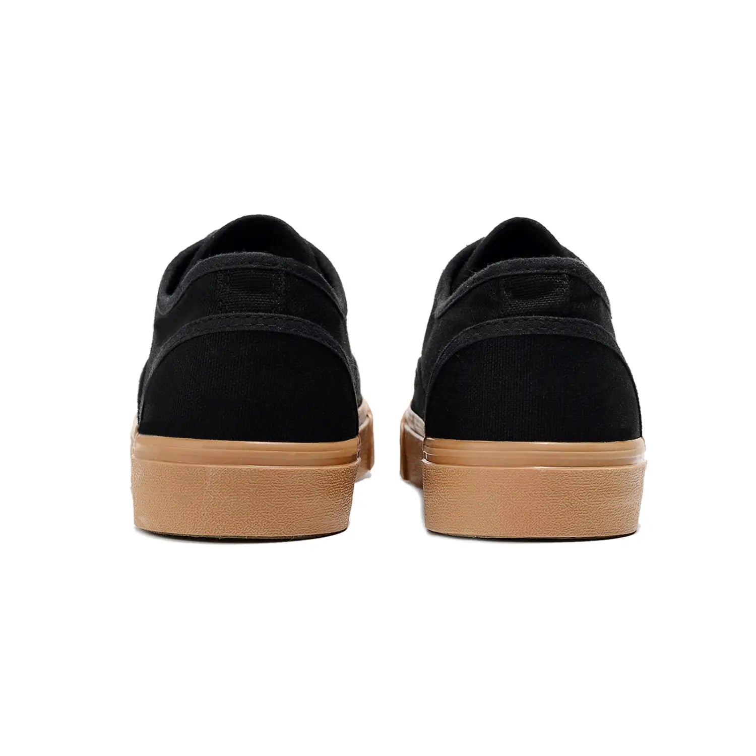 Baskets décontractées basses en toile à lacets pour femmes en noir, avec une semelle en caoutchouc beige, conçues pour un usage quotidien.