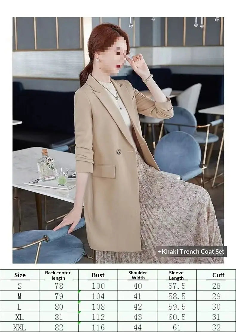 Beige khaki trench coat with three-quarter sleeves and double-breasted front designed as a casual blazer.