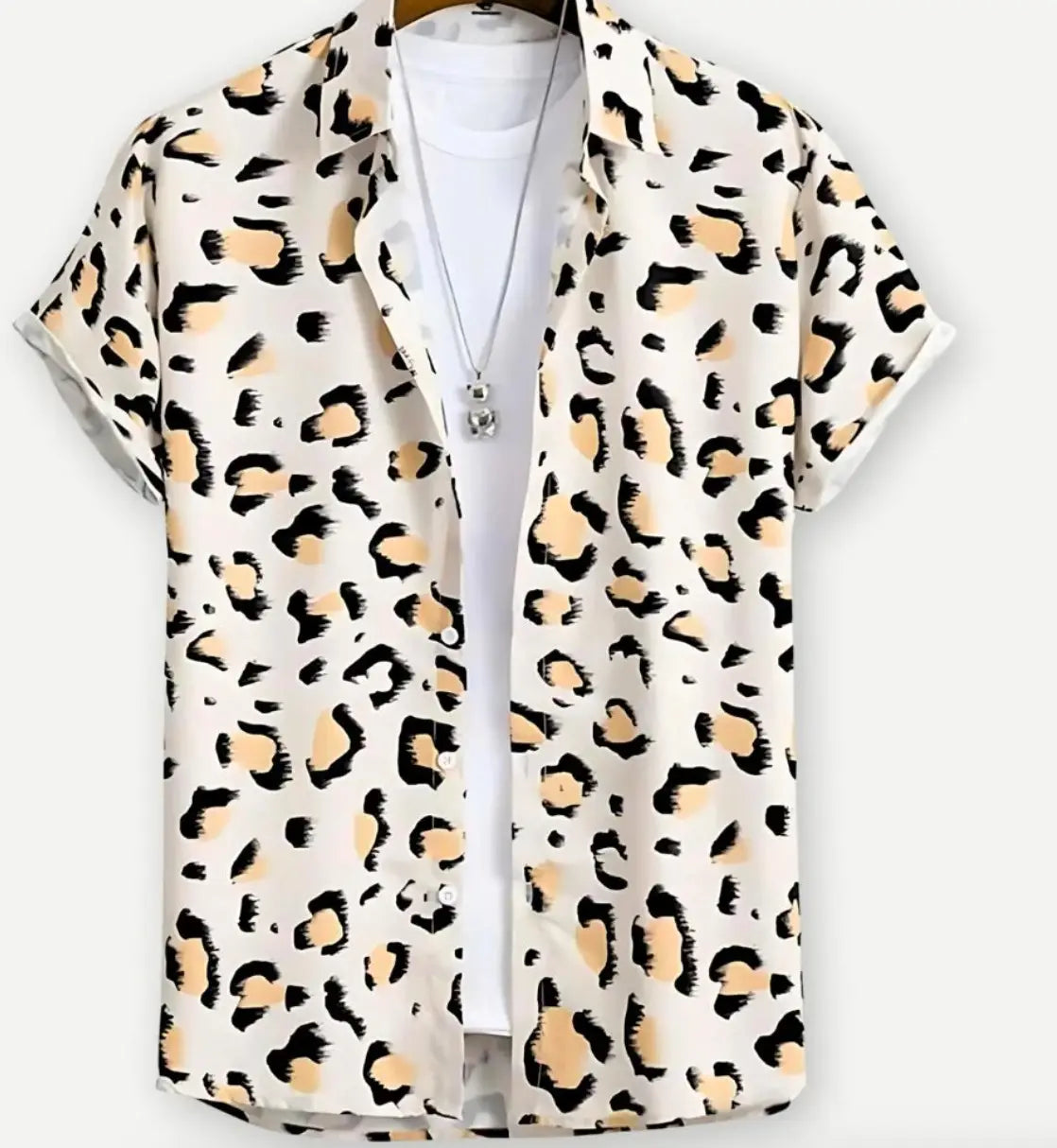 Floral Hawaiian short sleeve shirt for men featuring a cream base with bold black and tan leopard print in a short-sleeved button-up style.