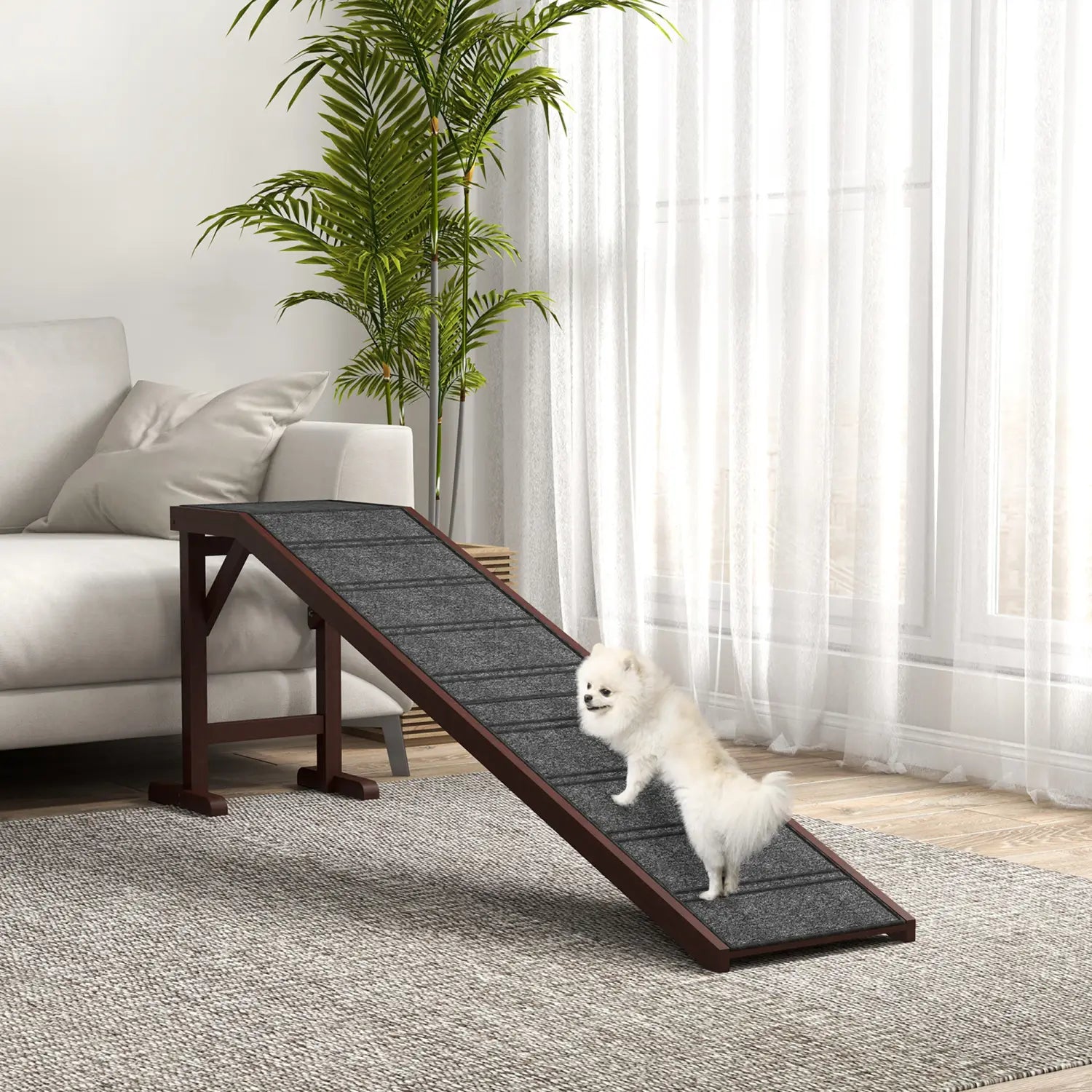 Dark brown wooden dog ramp with a textured gray carpeted surface featuring non slip pet stairs and a platform.