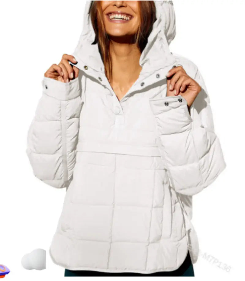 White quilted hooded puffer jacket for women with silver snap buttons and a front pocket.