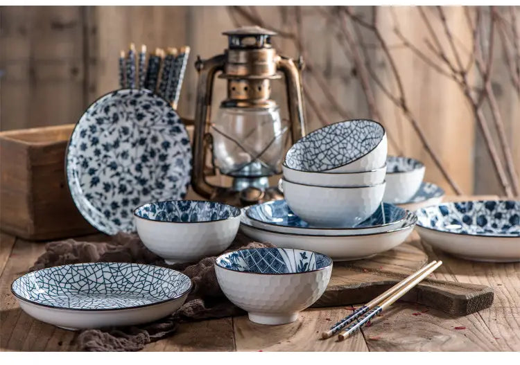 Blue and white ceramic dinnerware set featuring intricate floral and crackle glaze patterns in a Japanese tableware set blue ceramic floral bowl 10 piece.