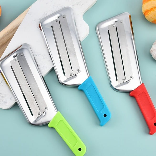 three stainless steel vegetable shredder slicer tools with colorful plastic handles in green blue and red for efficient food preparation