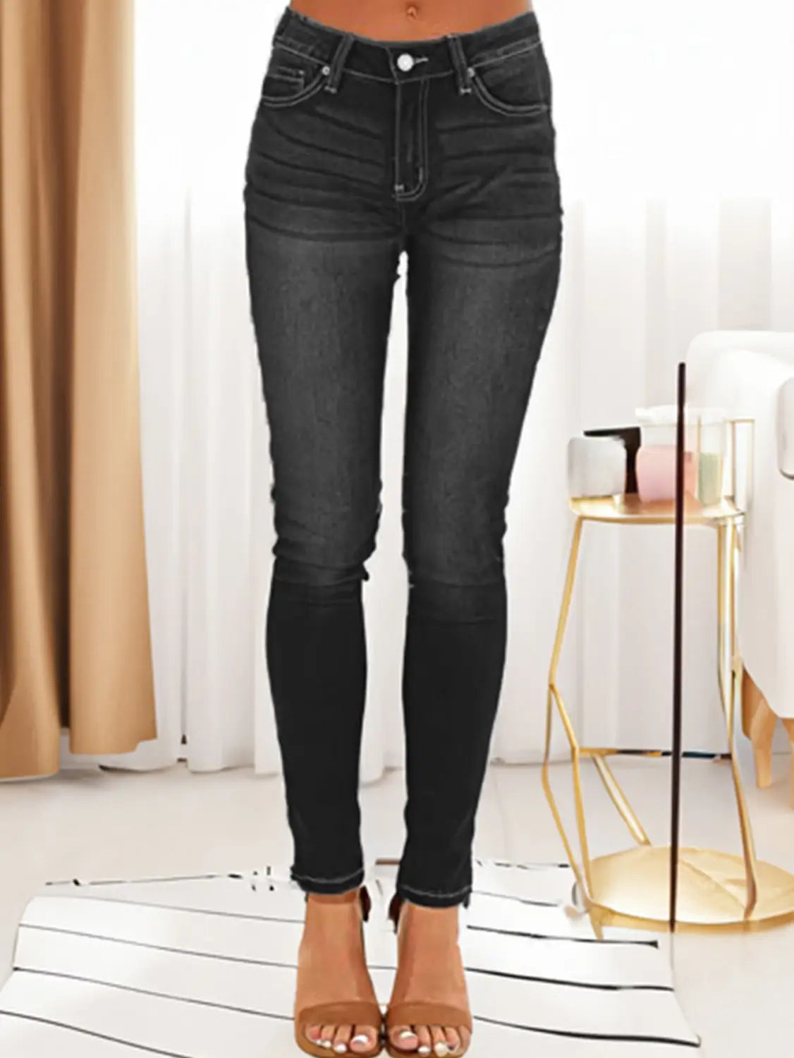 Black women’s high-waisted stretch skinny jeans with classic denim texture and subtle fading details
