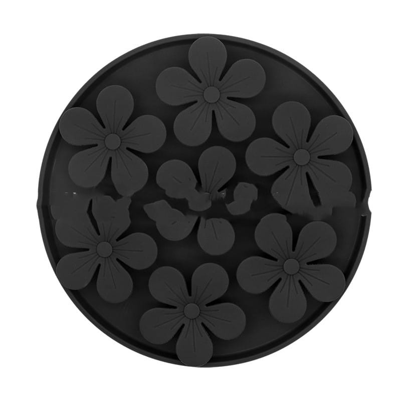 Tapis à lécher en silicone noir pour animal et dessous de plat pour mangeoire lente en silicone, avec des motifs floraux en relief conçus pour les chiens.