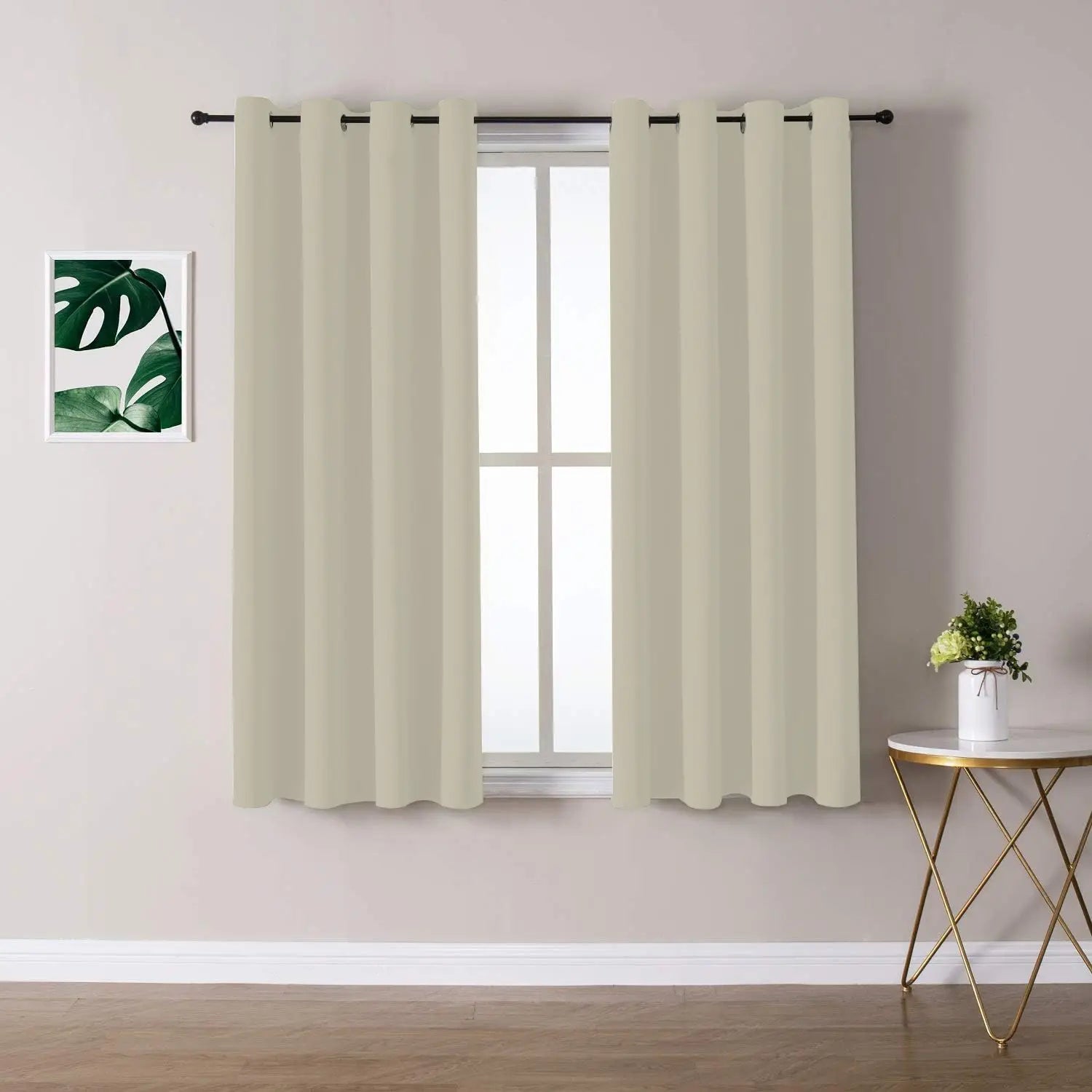 Cream-colored blackout curtains made of solid fabric with a simple grommet top design measuring 132x242cm.