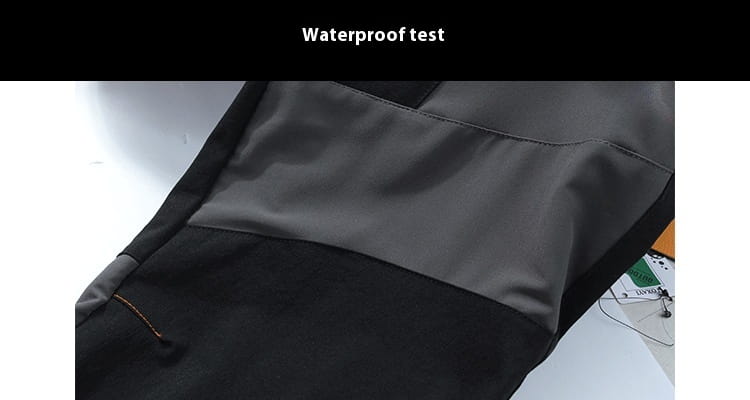 men’s waterproof tactical hiking pants in dark gray and black with reinforced stitching designed for durability and outdoor use