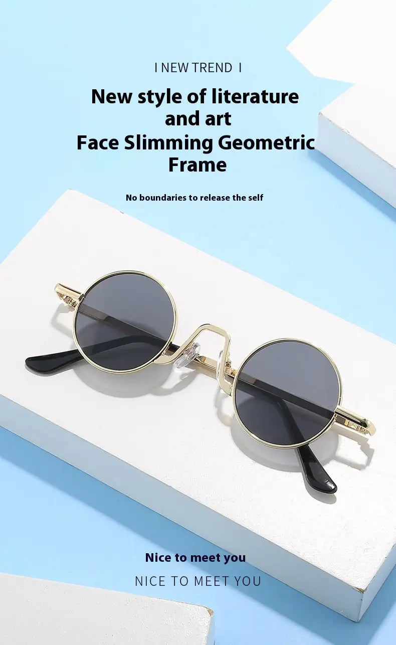 Gold-toned retro round hip hop sunglasses with dark gray mirrored lenses and black temple tips featuring a geometric face-slimming frame design.
