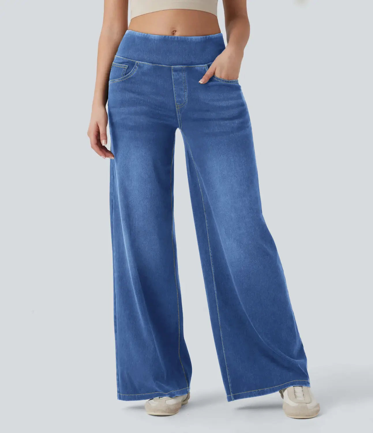 Blue wide-leg stretchy high waisted jeans made of denim with an elastic waistband.