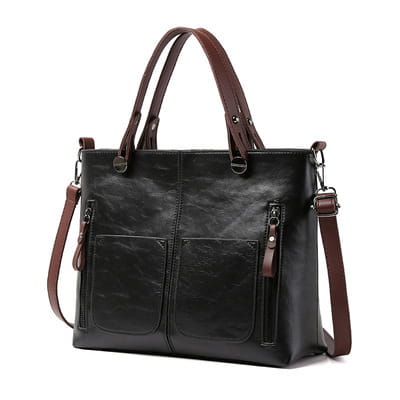 Black leather retro large capacity tote crossbody bag with brown handles and shoulder strap designed for laptop carrying.