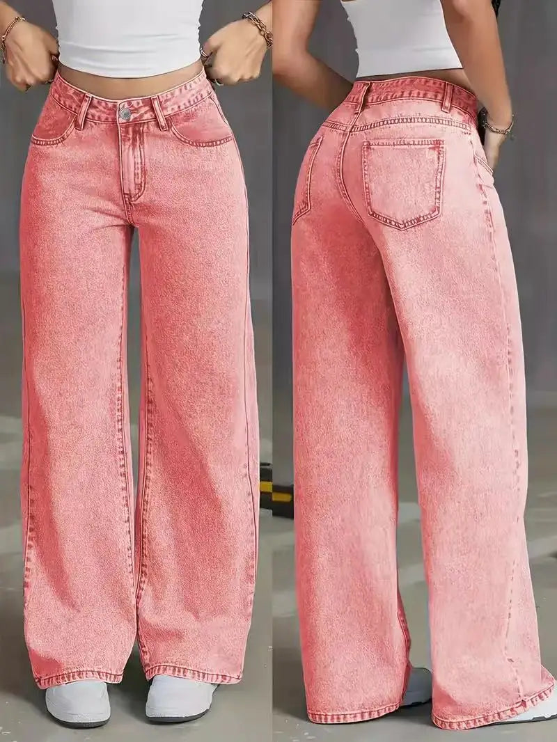 Jeans en denim rose taille haute, jambe évasée, présentant un effet délavé et un design classique à cinq poches dans un tissu en denim rose à jambe évasée