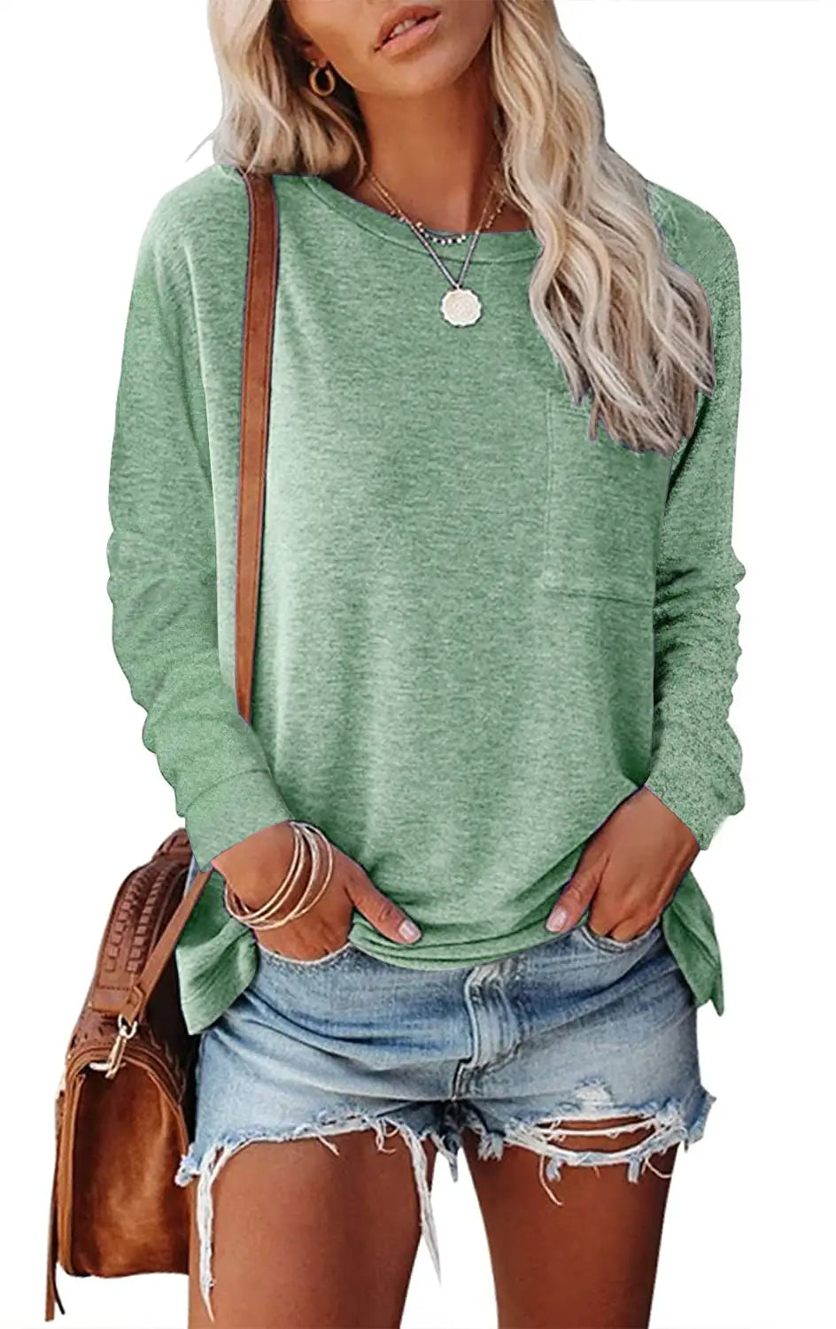 A relaxed fit soft heathered green knit long sleeve t-shirt with a single chest pocket.