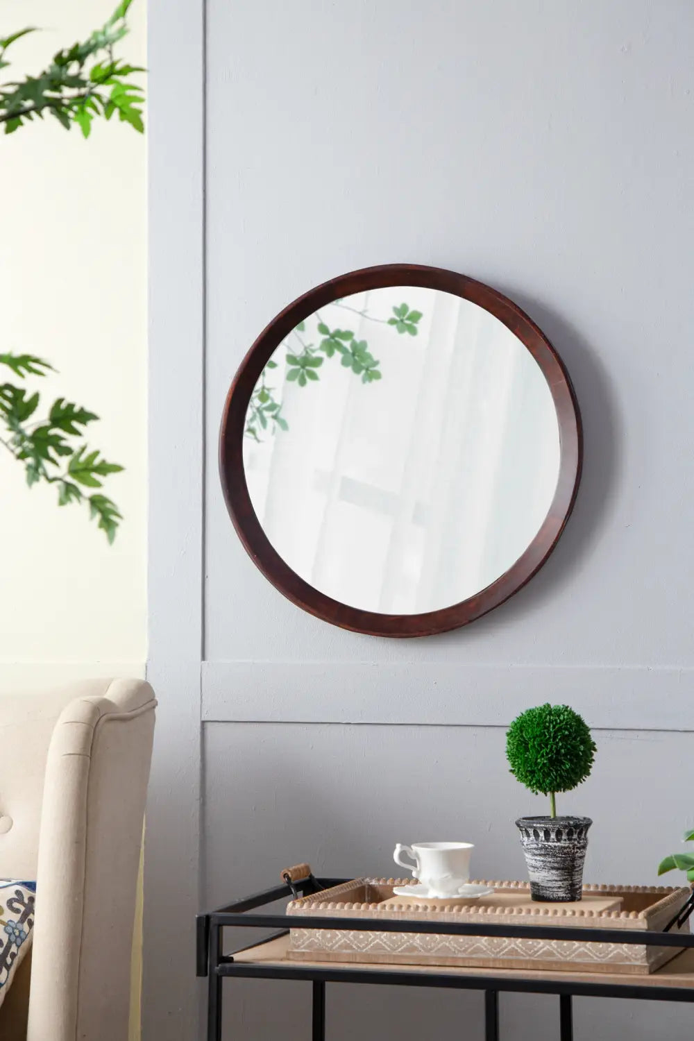 Round wooden-framed mirror 20 inch with a dark bronze finish made from mango wood for wall decoration.
