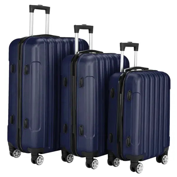 Set of three navy blue hard shell spinner suitcases with black trim and silver wheels in a 3-piece navy blue hard shell spinner luggage set.