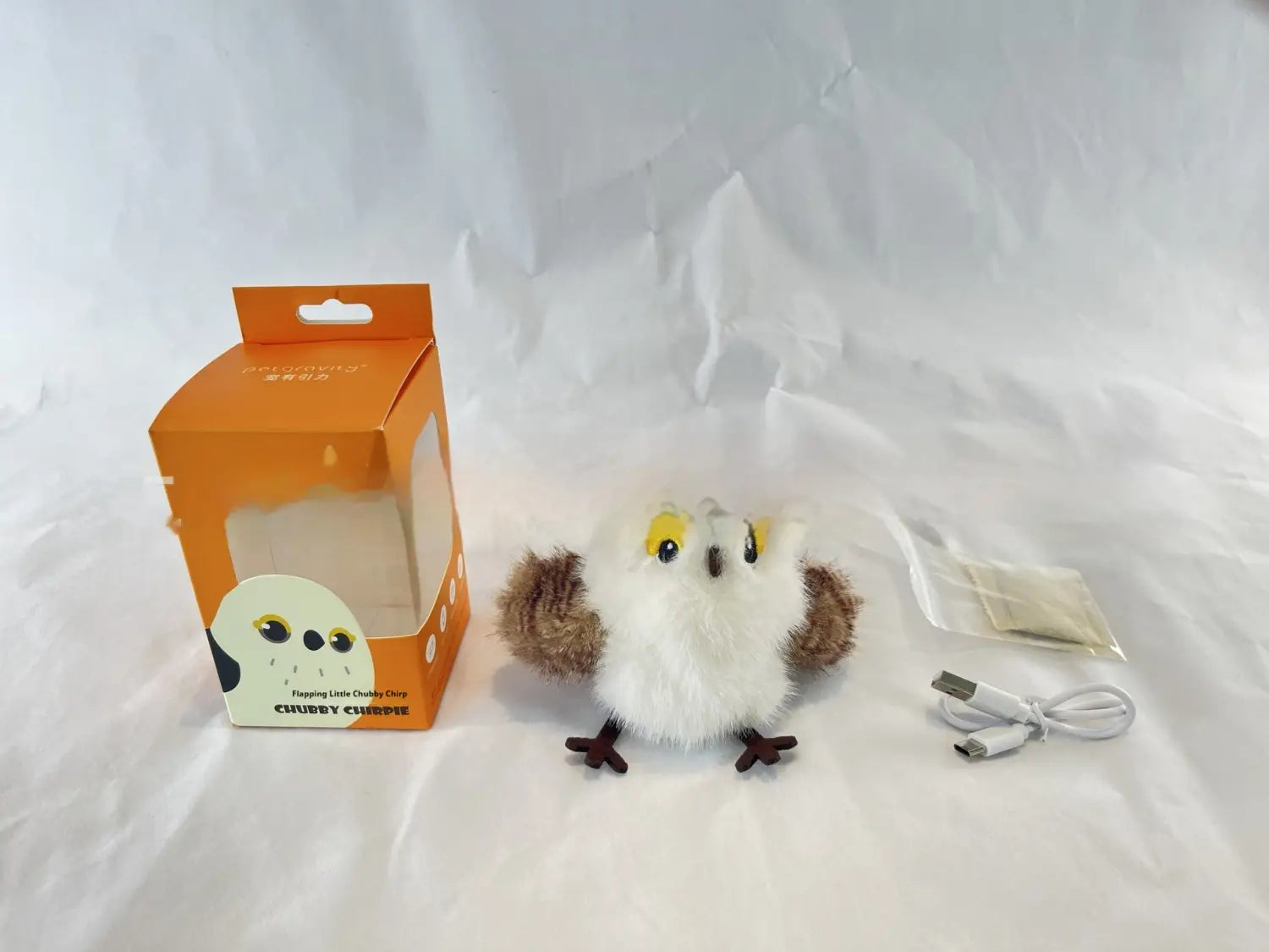 A plush white and brown owl toy with yellow eyes and black beak designed as an interactive automatic sounding bird cat toy.