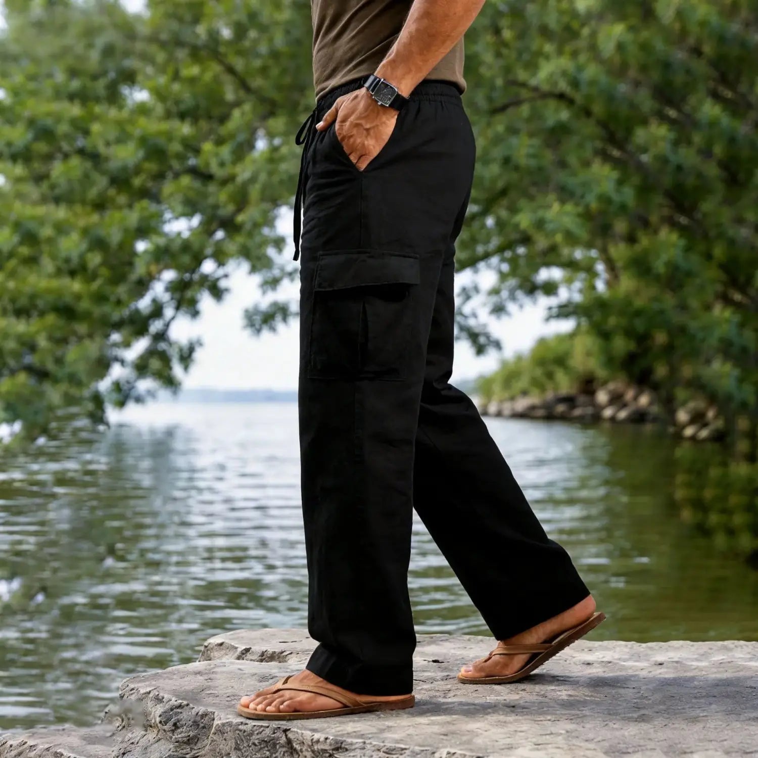 Black men cotton linen cargo pants with a drawstring waist and multiple pockets for casual wear.