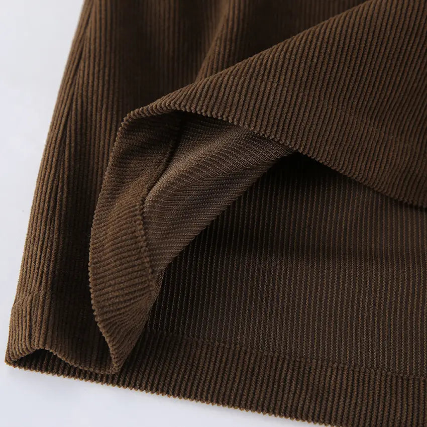 brown corduroy fabric with a distinct ribbed texture used in a retro corduroy mini skirt with matching belt