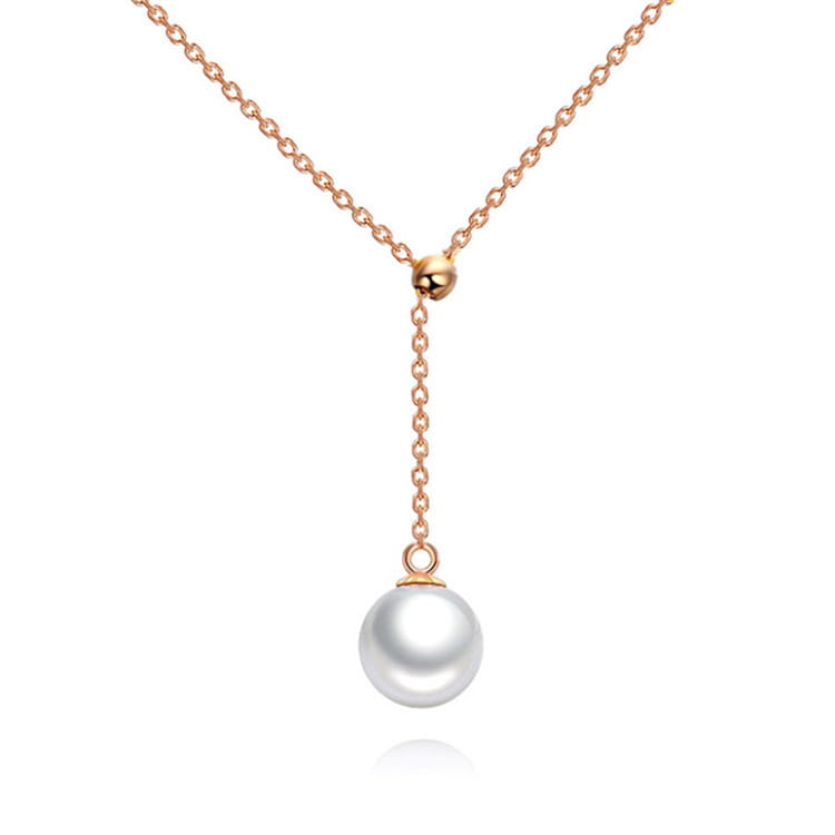 Adjustable pearl lariat necklace in rose gold and silver featuring a delicate rose gold chain with a single lustrous white pearl pendant.