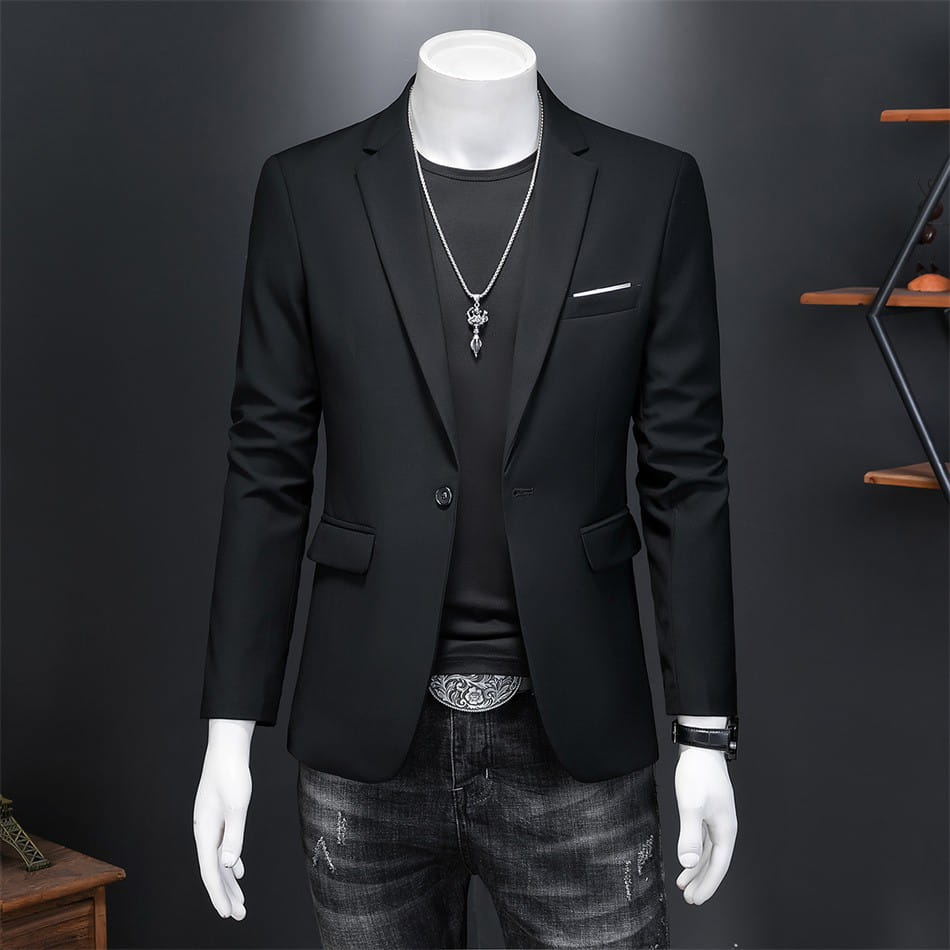 Chaqueta de vestir empresarial de pana negra para hombre con ajuste slim, corte a medida elegante y textura sutil vista desde el lado posterior