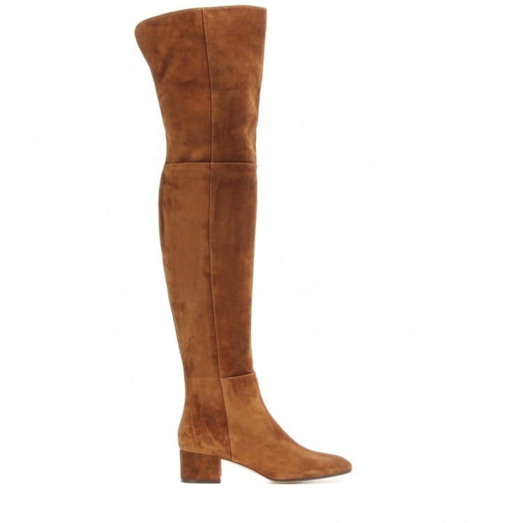 Over the knee tan suede boots with a low block heel shown from the back side.