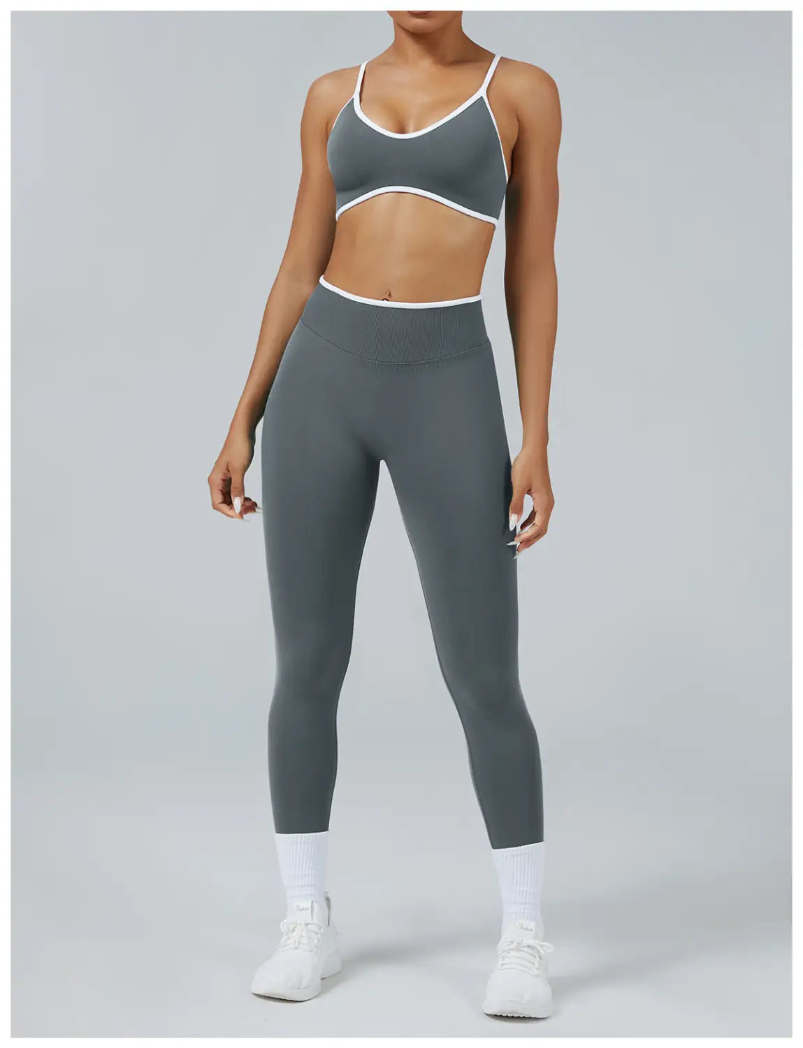 Seamless high waist sports yoga leggings in gray with white trim at the waistband and leg openings.
