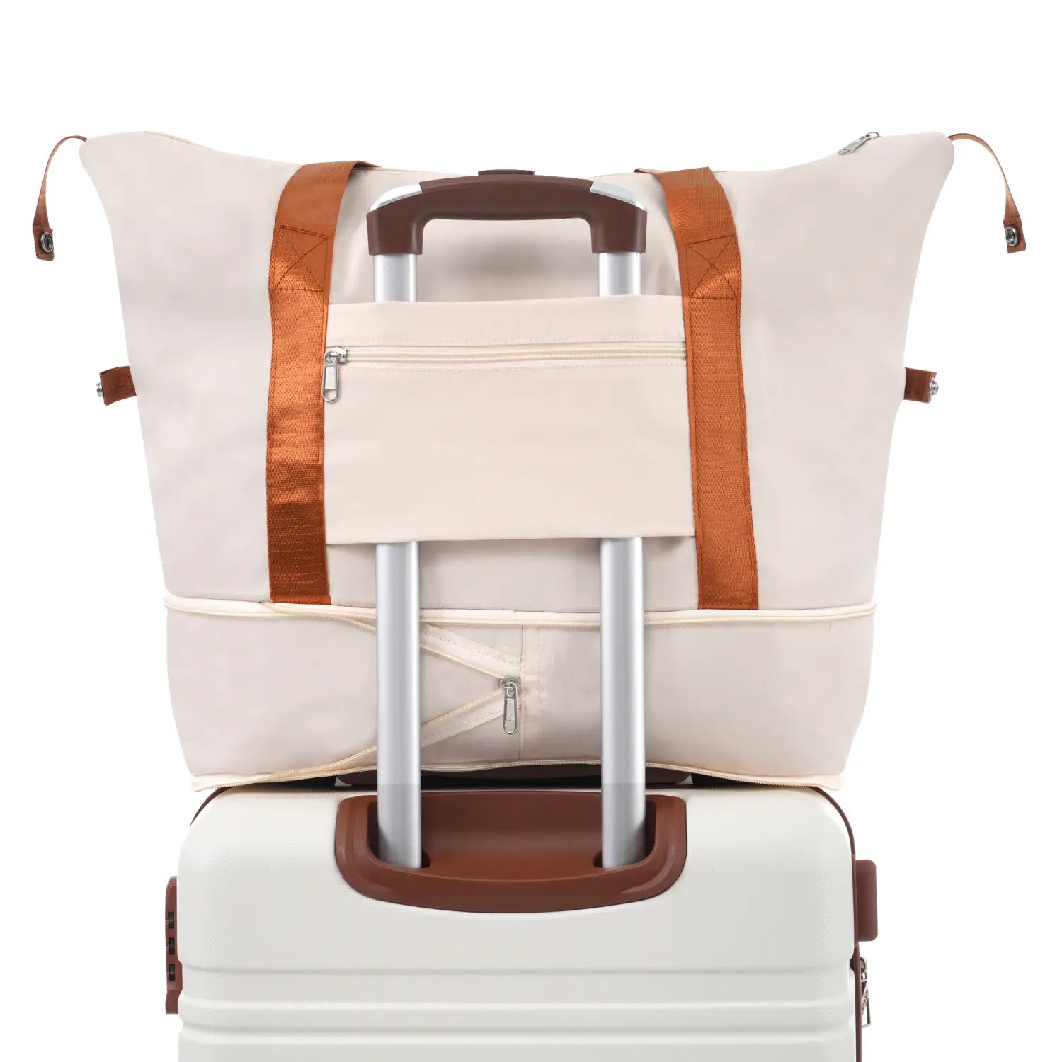 Cream-colored canvas travel bag with brown leather-like straps and front zippered pocket shown alongside vintage 24 inch hardshell luggage set with TSA lock in white.