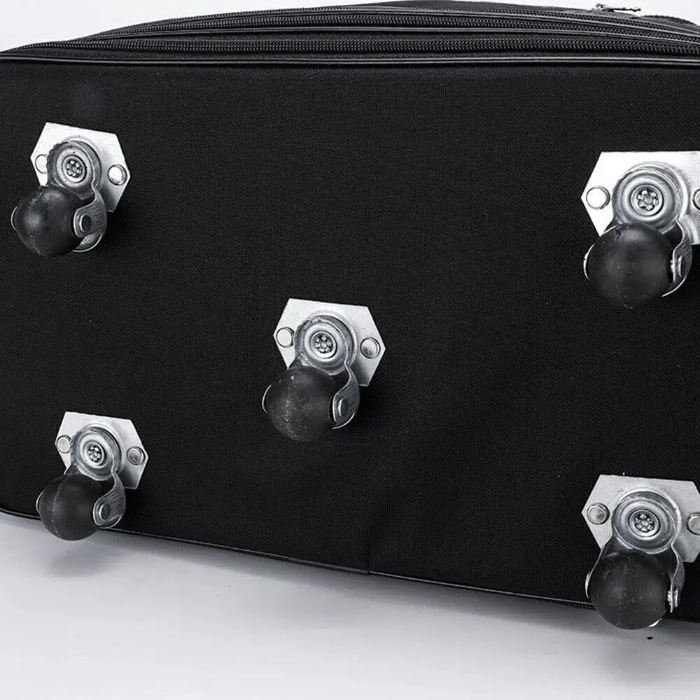 Black fabric 42 inch expandable lightweight rolling travel suitcase with four silver-toned spinner wheels.